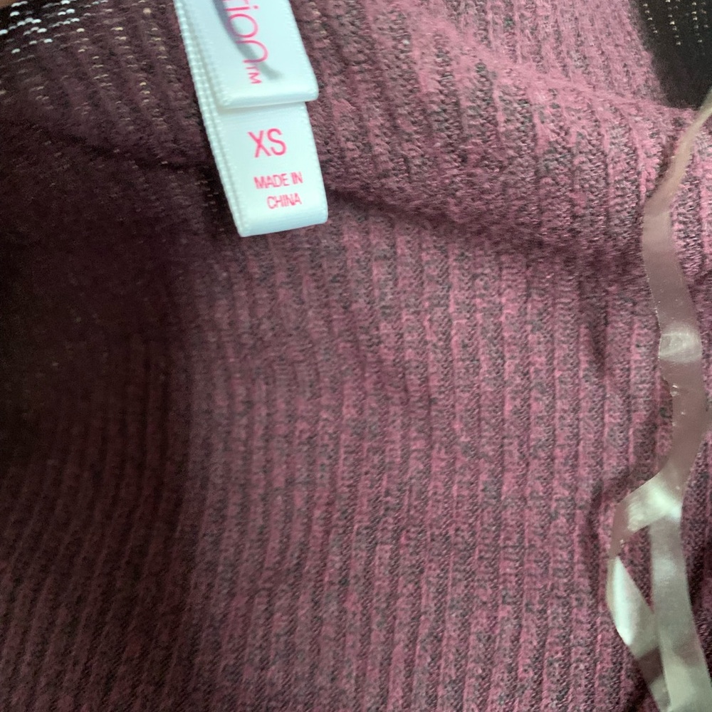 this is a maroon dress size xs very stretchy brand is xhilaration